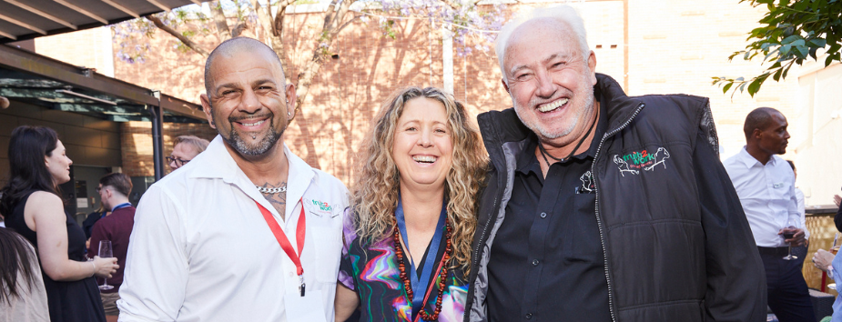 Group of people from Fruit2Work and Westpac Foundation smiling to camera